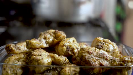 The-sight-of-steam-rising-off-freshly-cooked-chicken-meat,-showcased-in-a-close-up-bowl-shot,-evokes-the-anticipation-of-delicious-food-preparation