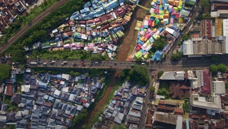 The-image-depicts-a-slum-tourism-area,-a-poverty-tourism-attraction-situated-near-an-industrial-area-in-Malang,-East-Java,-Indonesia