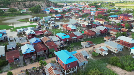 Cambodian-Village-Built-Above-Swamp-Land-Tracking-Right