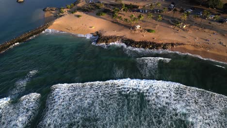 Waves-Crashing-Along-The-Sandy-Shores-Of-Haleiwa-Alii-Beach-In-Oahu,-Hawaii