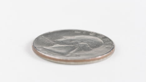 Washington-quarter-Laid-Flat-On-White-Table