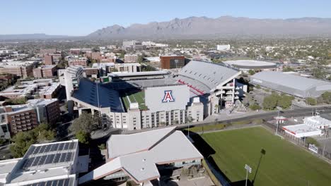 Arizona-Stadium-on-the-campus-of-the-University-of-Arizona-in-Tucson,-Arizona-with-drone-video-moving-in-a-circle