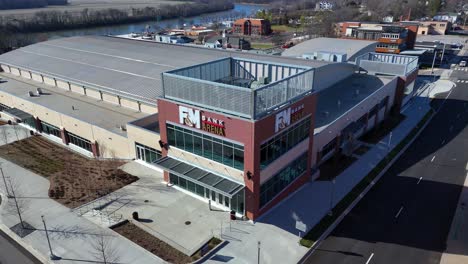 Rising-aerial-shot-of-the-front-entrance-of-F-and-M-Bank-Arena