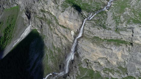 Aerial-shot-of-Cascata-di-Stroppia,-Italy,-with-majestic-waterfall-and-rugged-cliffs