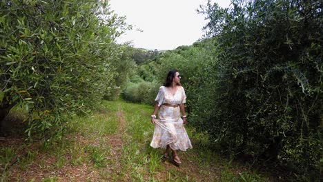 Female-Wearing-Dress-Walking-And-Enjoying-Vineyard-Landscape-In-Constantia,-Cape-Town,-South-Africa---Pullback