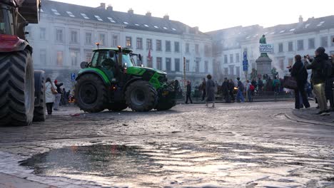 Farmers-arriving-at-the-Luxembourg-Square-to-protest-in-front-of-the-European-Parliament-in-Brussels,-Belgium---Slow-motion