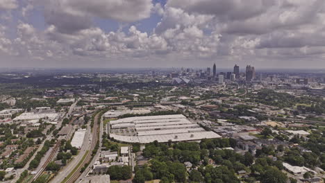 Atlanta-Georgia-Aerial-v982-cinematic-drone-reverse-flyover-Adair-Park-capturing-south-and-downtown-cityscape-on-the-skyline-with-dramatic-clouds-on-the-sky---Shot-with-Mavic-3-Pro-Cine---August-2023