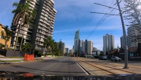 Point-of-view-driving-North-towards-Surfers-Paradise-and-Q1-on-the-Gold-Coast-Highway,-Gold-Coast