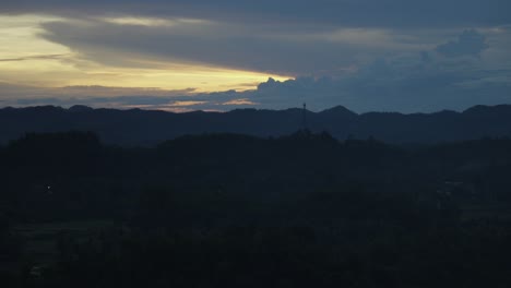Twilight-hues-over-Philippine-hills,-serene-dusk-settling,-time-lapse
