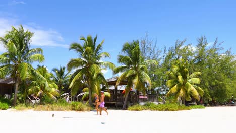 This-is-a-static-video-of-two-people-walking-on-a-beach-on-Exuma-in-the-Bahamas