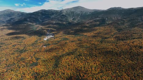 Aerial-View-Of-Mountain-Valley-And-Autumn-Forests---Drone-Shot