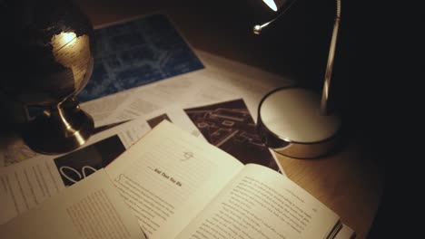 table-with-books-and-table-lamp