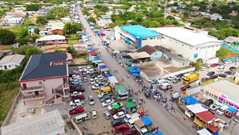Drone-ascends-above-tourists-and-locals-gathering-to-watch-Carnival-grand-march-in-Curacao