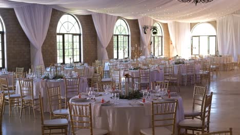 Fancy-Wedding-Hall-With-Luxury-Wedding-Reception-Tables---Wide-Shot