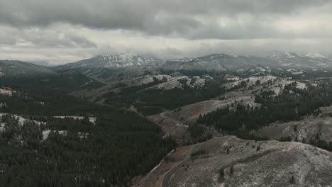 Road-Over-Sloping-Mountains-During-Winter-Near-Sun-Valley,-Idaho,-USA