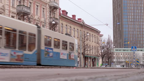 Tram-pass-by-on-street-with-European-buildings-having-unique-architectural-style
