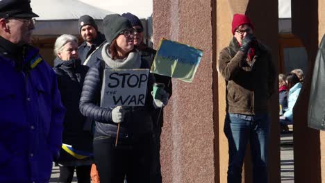 Woman-with-Stop-the-War-sign-at-protest-against-Russian-war-in-Ukraine