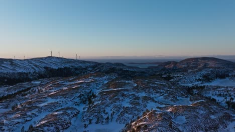 Mountain-Landscape-And-Windmills-In-Bessaker,-Norway---Aerial-Drone-Shot