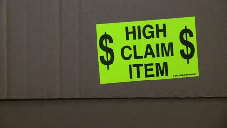 Neon-Green-High-Claim-Item-Label-On-Side-Of-Carton-Box-For-Shipping