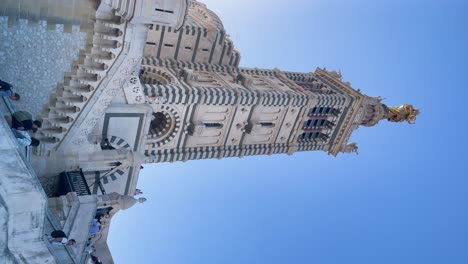 Vertical-shot-of-Notre-Dame-de-la-Garde-church-in-Marseille,-France