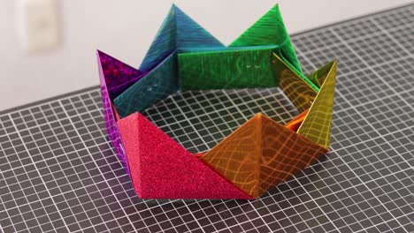 Dazzling-rainbow-crown-metallic-PVC-takes-on-a-colorful-shape