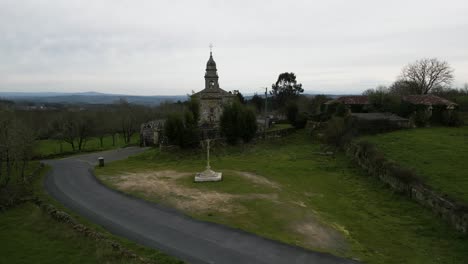 Asphalt-road-leads-to-entrace-of-Church-of-santa-maria-de-salamonde-in-San-Amaro-Spain