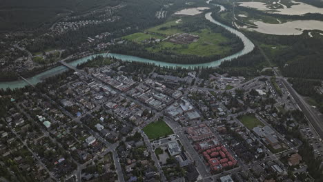 Banff-AB-Canada-Aerial-v4-high-altitude-birds-eye-view-flyover-the-town-capturing-Bow-river,-Vermilion-lakes,-forested-valley,-Snow-Peak-and-Cascade-mountains---Shot-with-Mavic-3-Pro-Cine---July-2023