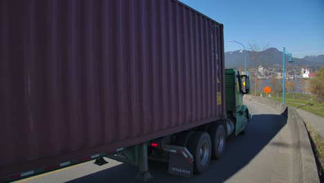 Heavy-Trucks-Passing-by,-Street-in-East-Vancouver---Sunny-Day---SLOMO