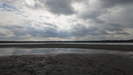 Panoramic-view-from-the-surroundings-of-Lake-Öreg-in-winter-time-with-low-water-levels,-including-the-local-forests-and-castle-in-the-background-from-Tata,-Hungary