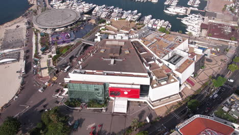 Palace-of-Festivals-and-Congresses,-Aerial-View-of-Cannes-Movie-Festival-Theater-Venue,-Revealing-Drone-Shot