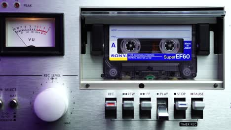 Pressing-Play-and-Playback-of-Sony-Audio-Cassette-Tape,-Old-Deck-Player-With-VU-Meter