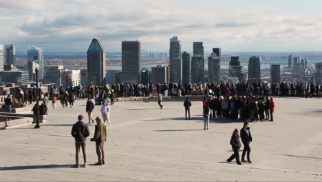 Tourists-at-Kondiaronk-Belvedere-soak-in-the-panoramic-vista-of-Montreal's-cityscape