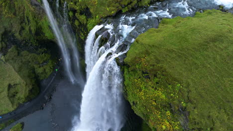 Seljalandsfoss-Waterfall-In-Green-Landscape-In-Iceland---Aerial-Drone-Shot