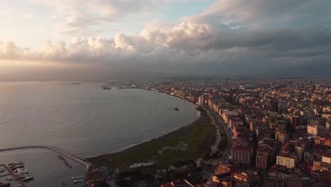 Panoramic-view-of-the-beautiful-town-of-Castellamare-di-Stabia,-accompanied-with-sunset