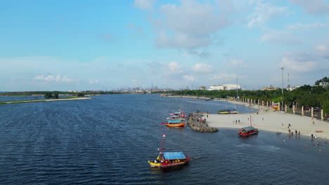 Tourist-Boat-Chugs-Out-To-Sea-From-Ancol-Beach-Jakarta-Indonesia