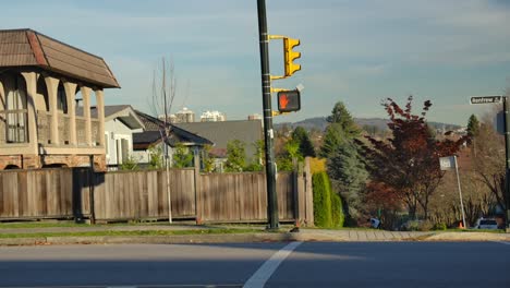 Traffic-And-Pedestrian-Signal-Lights-On-The-Street-In-East-Vancouver,-Canada