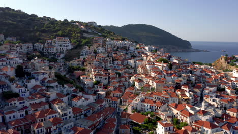 Aerial-view-over-the-famous-Skopelos-town,-chora-in-Sporades,-Aegean,-Greece