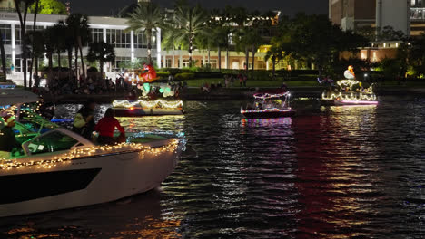 Christmas-Holiday-Boat-Parade-Along-The-Hillsborough-River-In-Downtown-Tampa,-Florida,-United-States