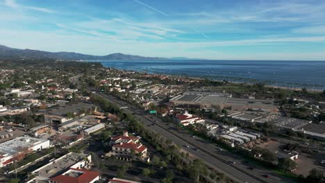 drone-aerial-view-flying-towards-santa-barbara-with-heavy-traffic-on-the-101