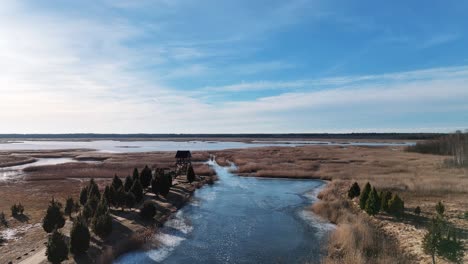 Birdwatching-Tower-of-Riekstusala-at-Kaniera-Lake-Lapmezciems,-Latvia-Reed-Trail-in-Kemeri-National-Park-Fund-With-Swamps-and-Many-Tiny-Lakes