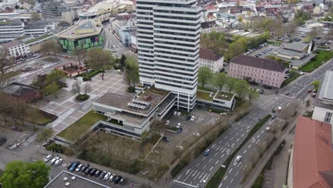 Kaiserslautern-city-center-and-traffic-at-street-intersection,-Aerial