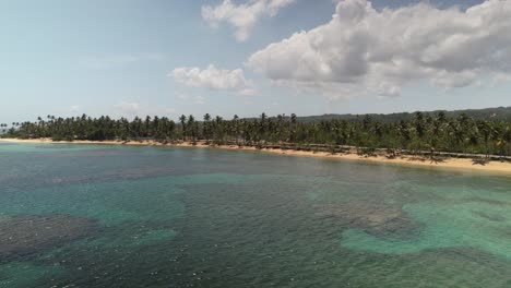 Aerial-View-over-Las-Terrenas-Beach-Coastline-Seashore-with-Turquoise-Water