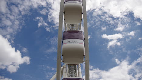 The-View-Ferris-Wheel-Set-Against-a-Stratus-Sky-Backdrop-in-Antwerp,-Belgium---Low-Angle-Shot