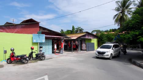 View-of-tourism-Tais-Market-and-passing-traffic-with-gifts-and-souvenirs-for-visitors-in-the-capital-city-of-East-Timor,-Southeast-Asia