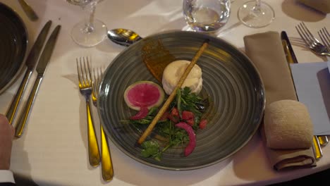 Elegantly-plated-fine-dining-entree-with-artistic-flair