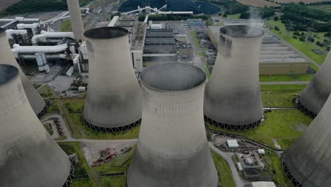 Ratcliffe-on-Soar-power-station-aerial-view-looking-down-over-smoking-coal-powered-nuclear-fired-cooling-towers