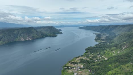 Island-appears-as-verdant-oasis-surrounded-by-tranquil-waters-of-Lake-Toba