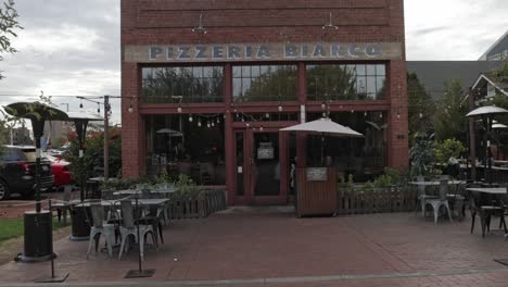 Pizzeria-Bianco-restaurant-outside-located-in-Phoenix,-Arizona-with-video-panning-right-to-left