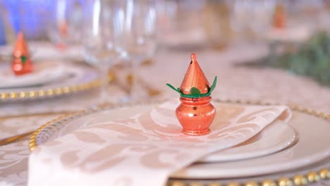 Decorative-Setup-on-a-Dining-Table-During-an-Indian-Wedding-Reception---Close-Up