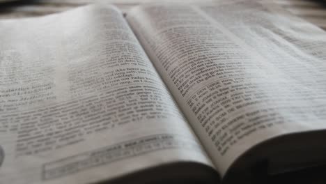 Shallow-focus-of-pages-being-turned-in-a-Norwegian-bible